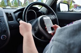 Driver using phone at wheel